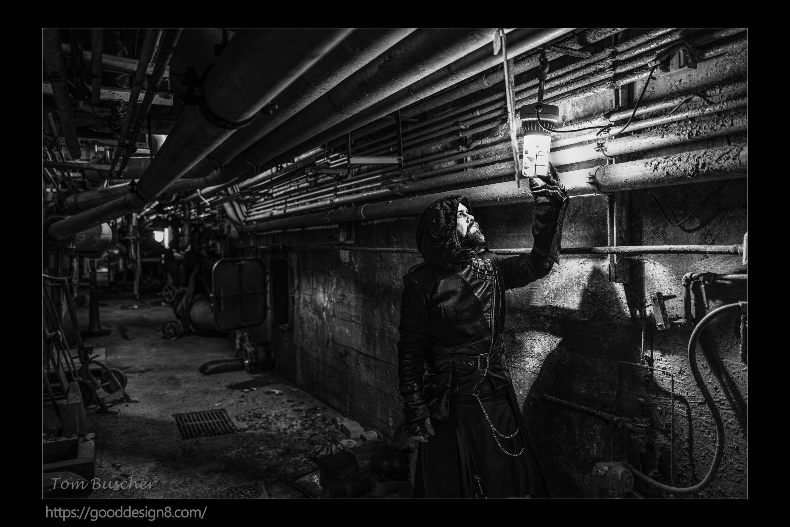 man checking lightbulb in a dark industrial basement