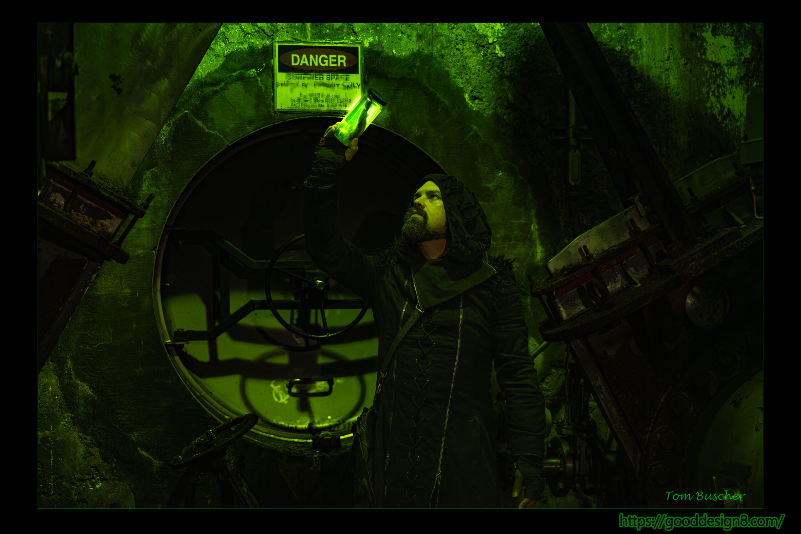 man examining a jar in an industrial basement