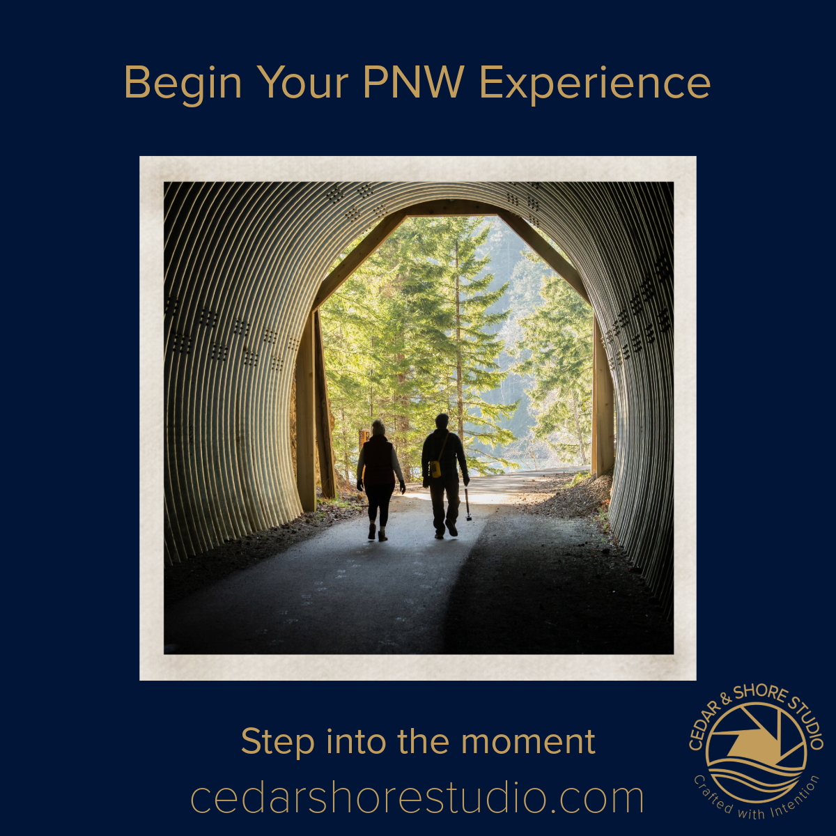 two people walking through a tunnel to the lake.